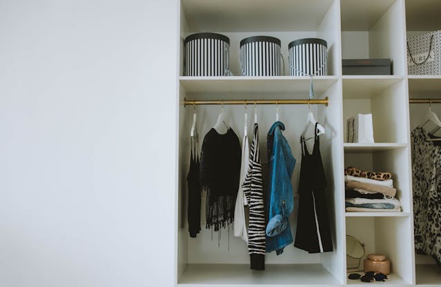 closet with clothes in the cubes